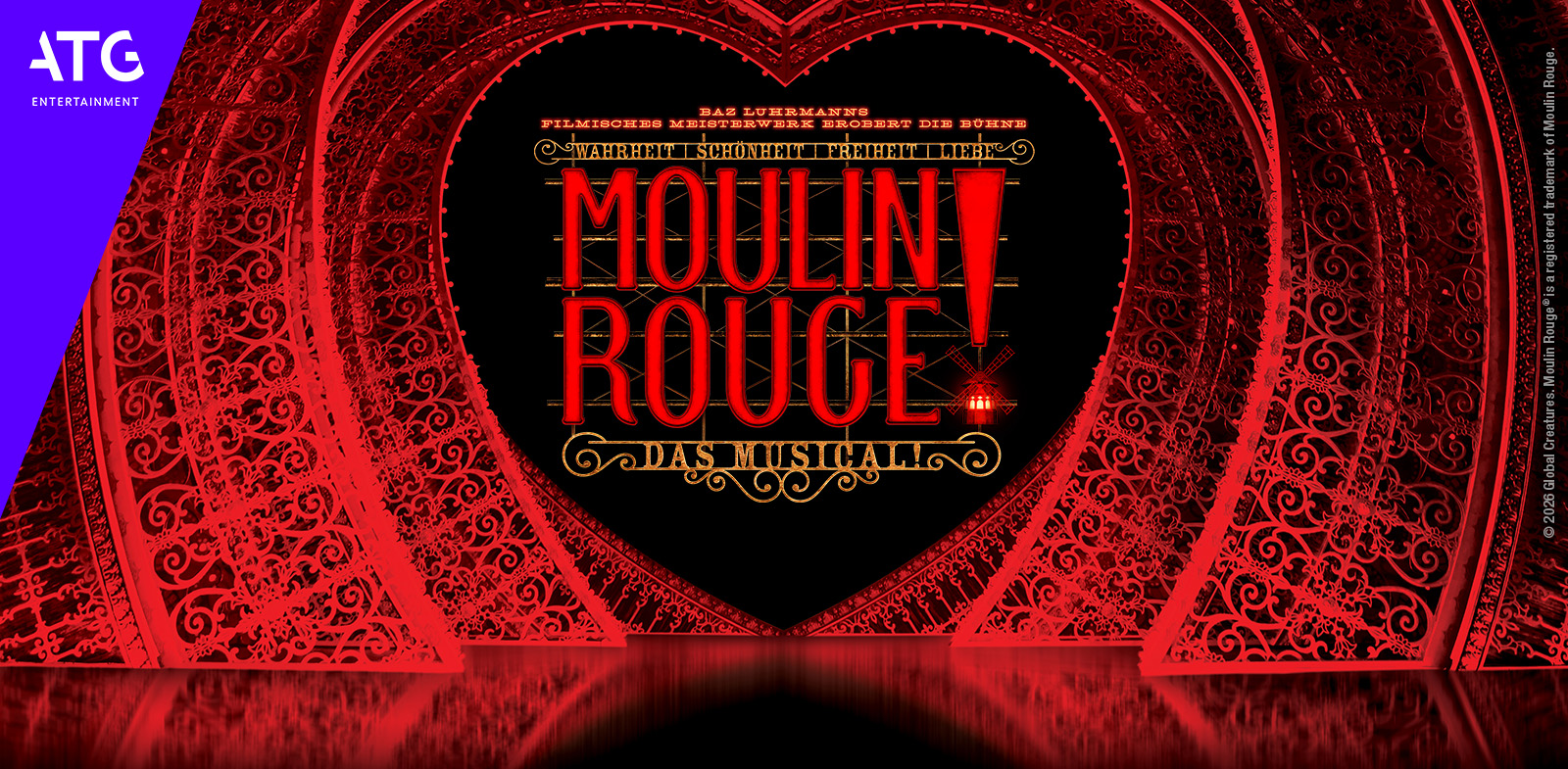 Schriftzug Moulin Rouge in der Mitte eines roten Herzens